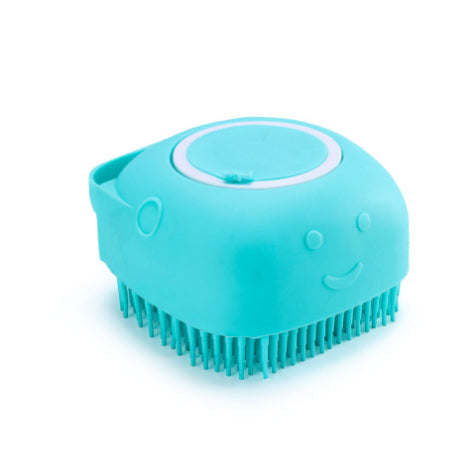 Turquoise square reservoir dog bath brush with flexible bristles on a white background.